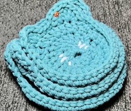 Cat-shaped crochet trinket dishes - small, medium and large.